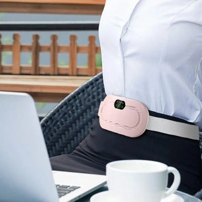 WarmCore Pro belt worn under a shirt at a desk, slim enough to stay hidden at work